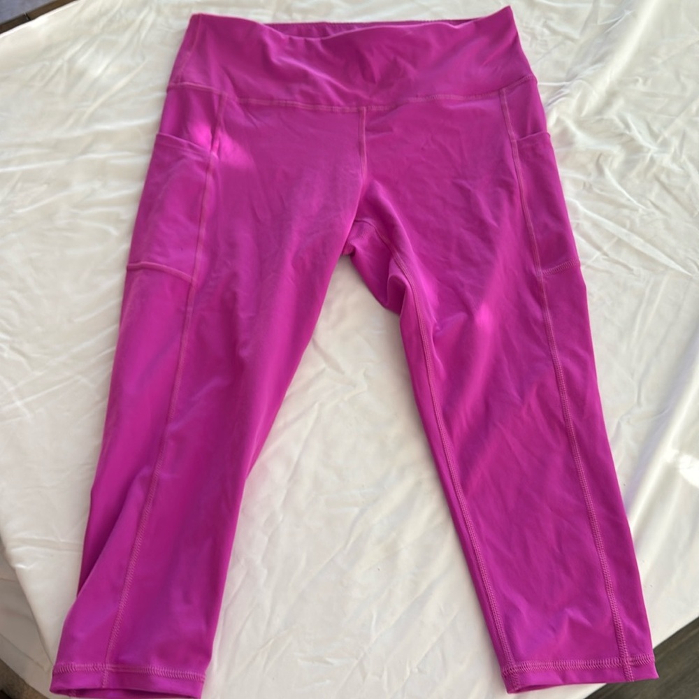 Brand new pinkish, purple leggings size large
